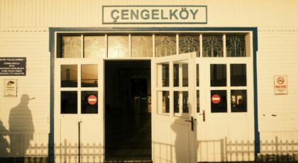 Sunset light casting shadows at Çengelköy Pier entrance, Istanbul, Türkiye.