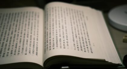 Open book displaying Chinese characters, representing literature and knowledge. Perfect for educational content.