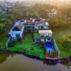 Stunning aerial view of a luxury villa by the river in Tangerang, Indonesia.